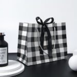 Black and White Checkered Gift Bag with Black Ribbon - Image 3